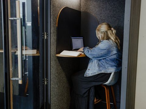 Take a virtual meeting in our noise reducing phone booth.